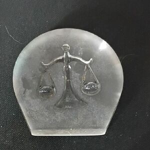 Elegant Clear Paperweight with Scales Design
